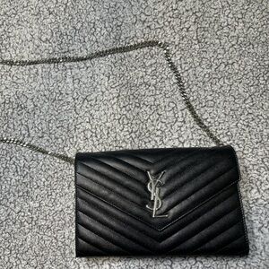 YSL wallet on a chain.